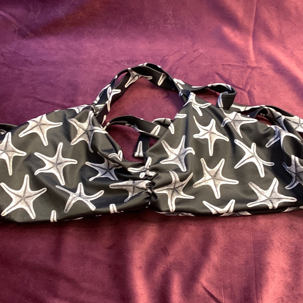 Large bikini top black and white star fish. Fused